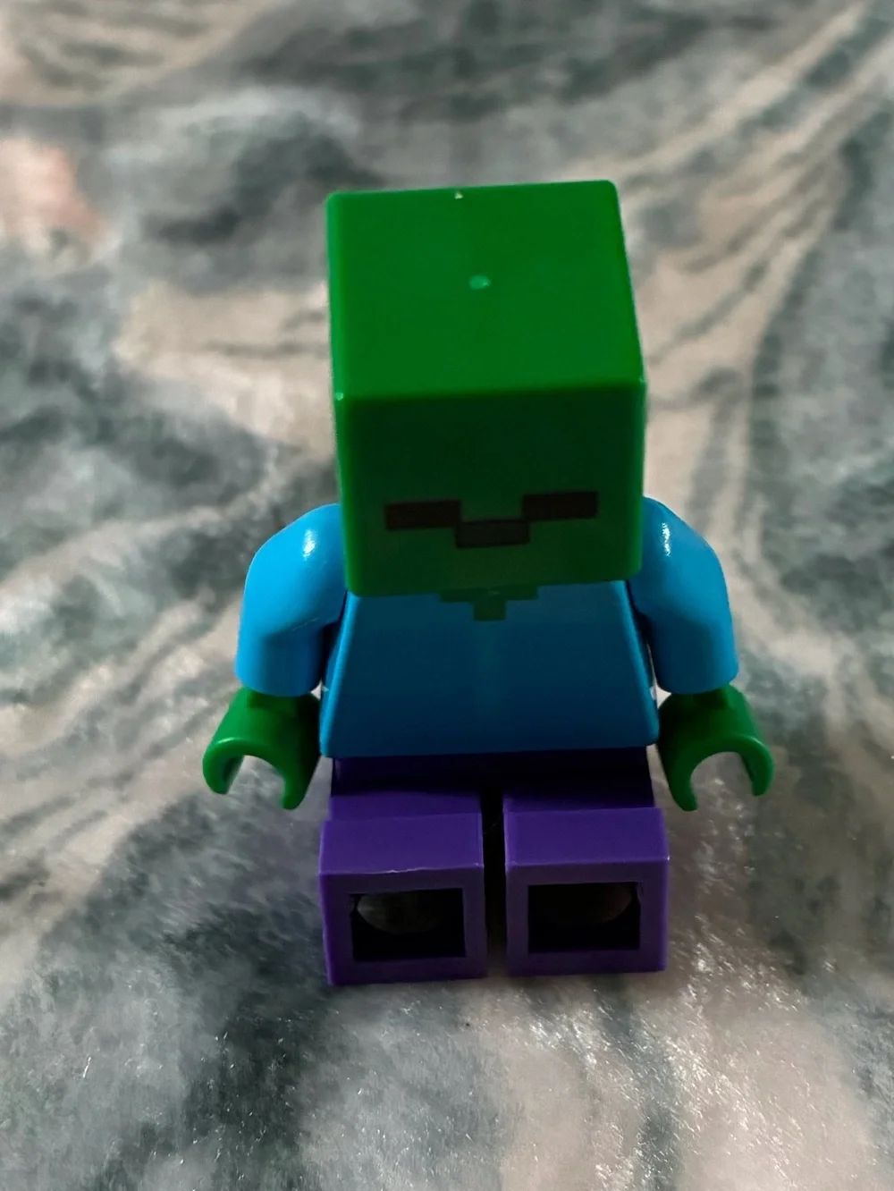 Green-Head Figure with Teal Torso & Purple Legs